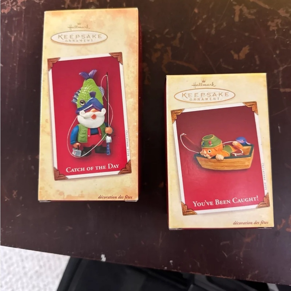 Two Hallmark fishing ornaments